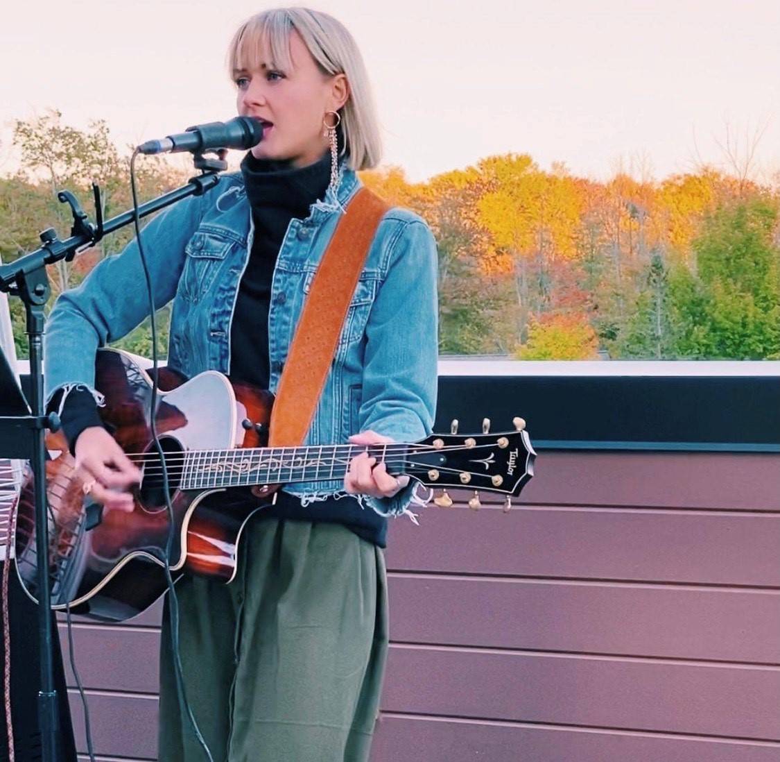 Meg Gunia singing on stage